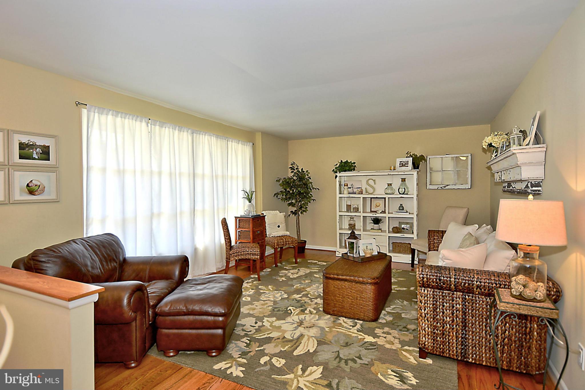 19508 Olney Mill Road Olney, MD 20832 - Photo 11 of 29 a living room with furniture and a window
