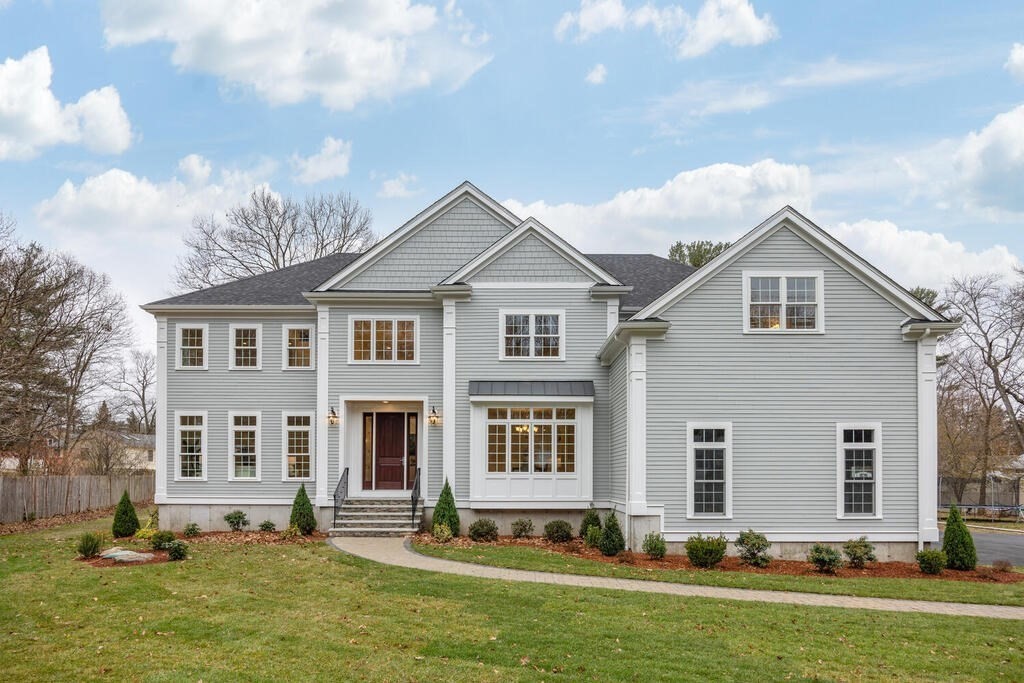 5 Robin Hood Lane Burlington, MA 01803 - Photo 1 of 42 a front view of a house with a yard