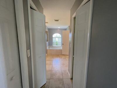 350 Southwest Covington Road Port St. Lucie, FL 34953 - Photo 12 of 33 ENTRANCE TO MASTER BATH