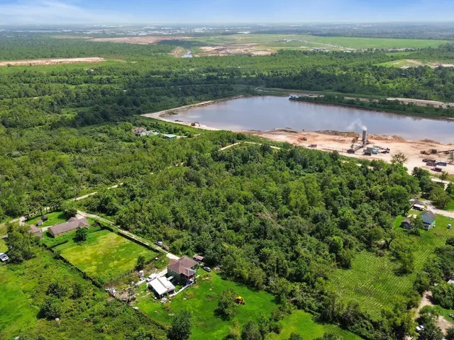 a view of a lake with a city