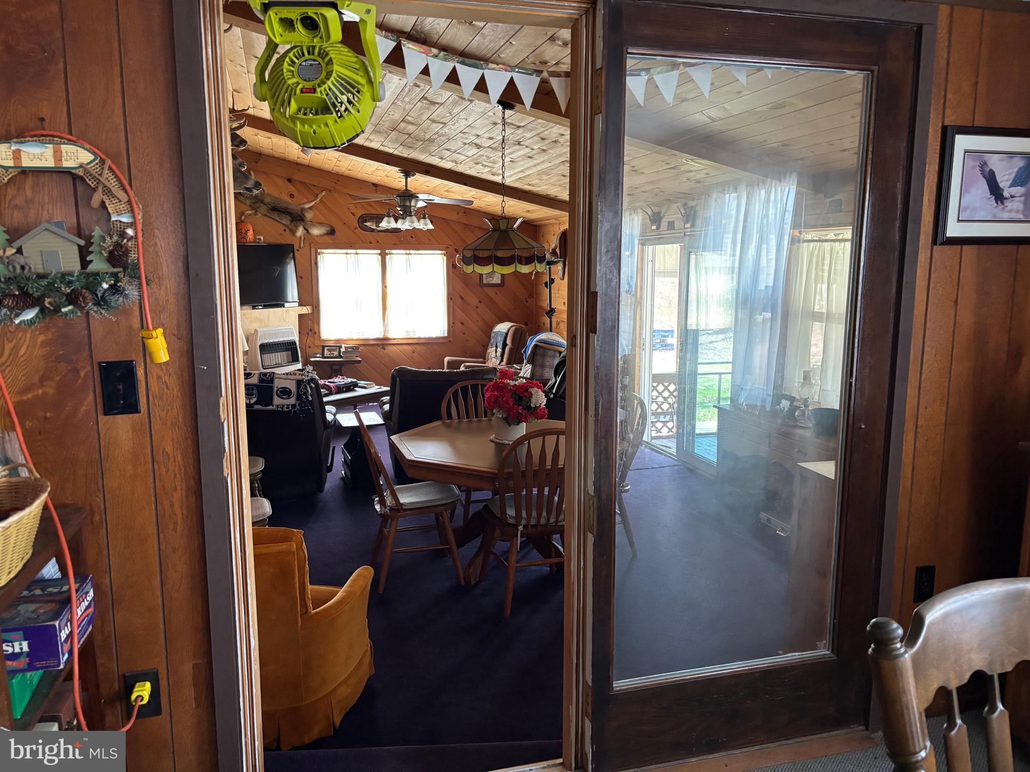 1066 Eddy Ridge Road Orviston, PA 16864 - Photo 18 of 44 a view of dining area with chandelier