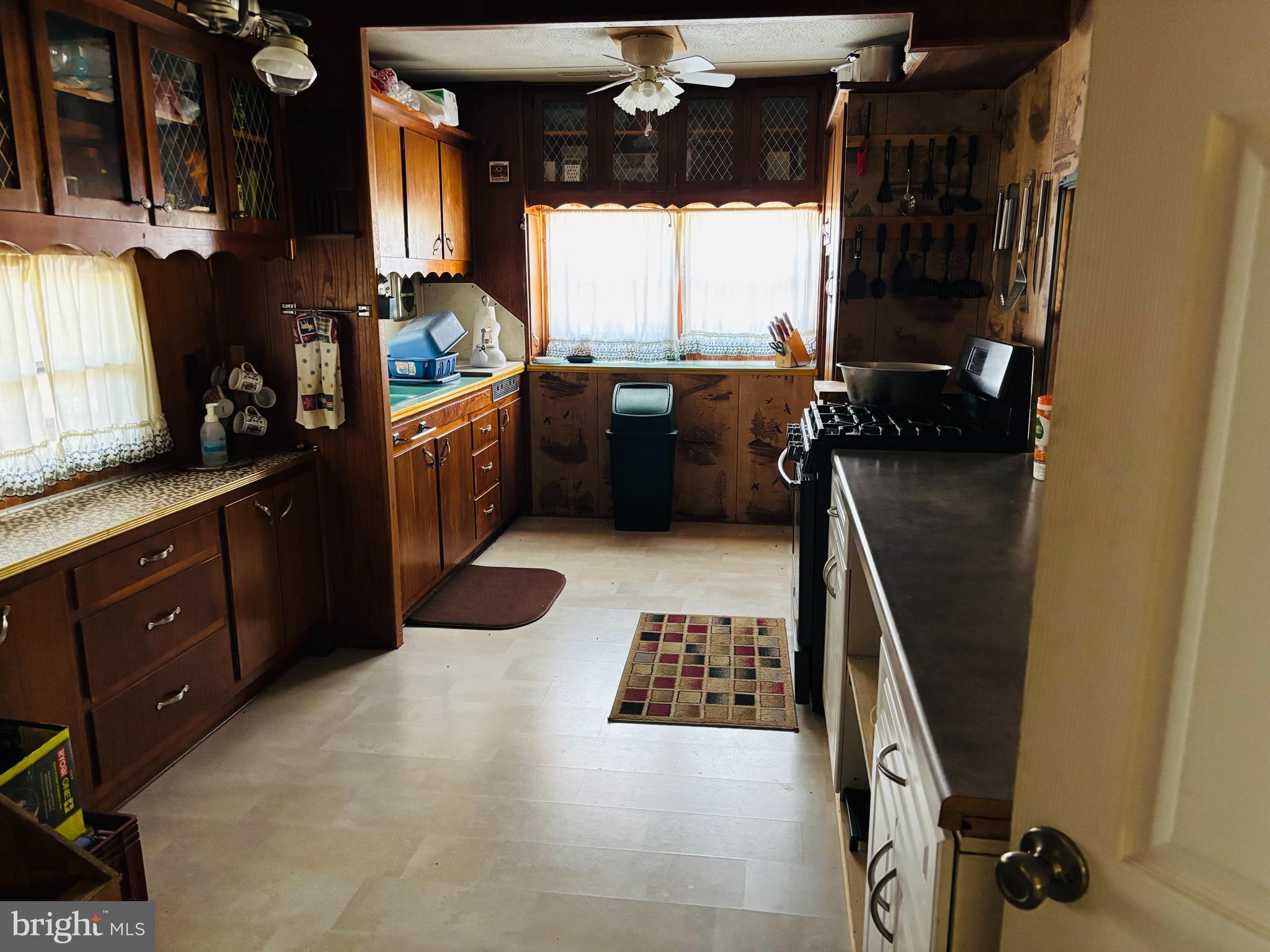 1066 Eddy Ridge Road Orviston, PA 16864 - Photo 23 of 44 a kitchen with a sink appliances and cabinets