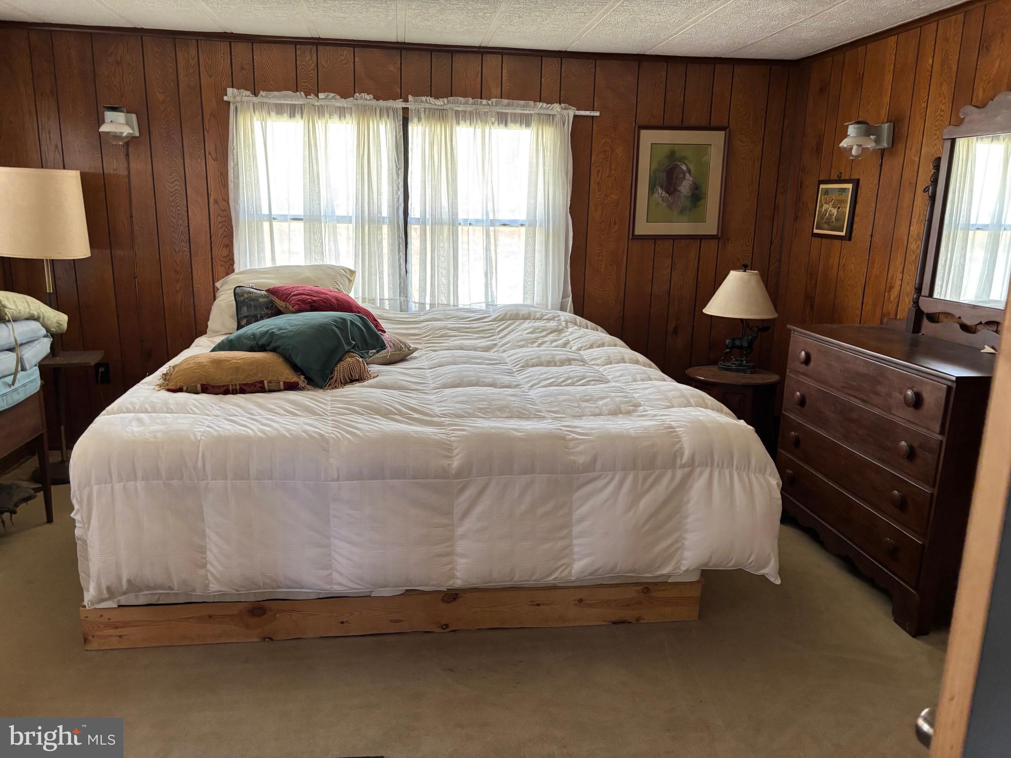 1066 Eddy Ridge Road Orviston, PA 16864 - Photo 28 of 44 a bedroom with a bed and a window