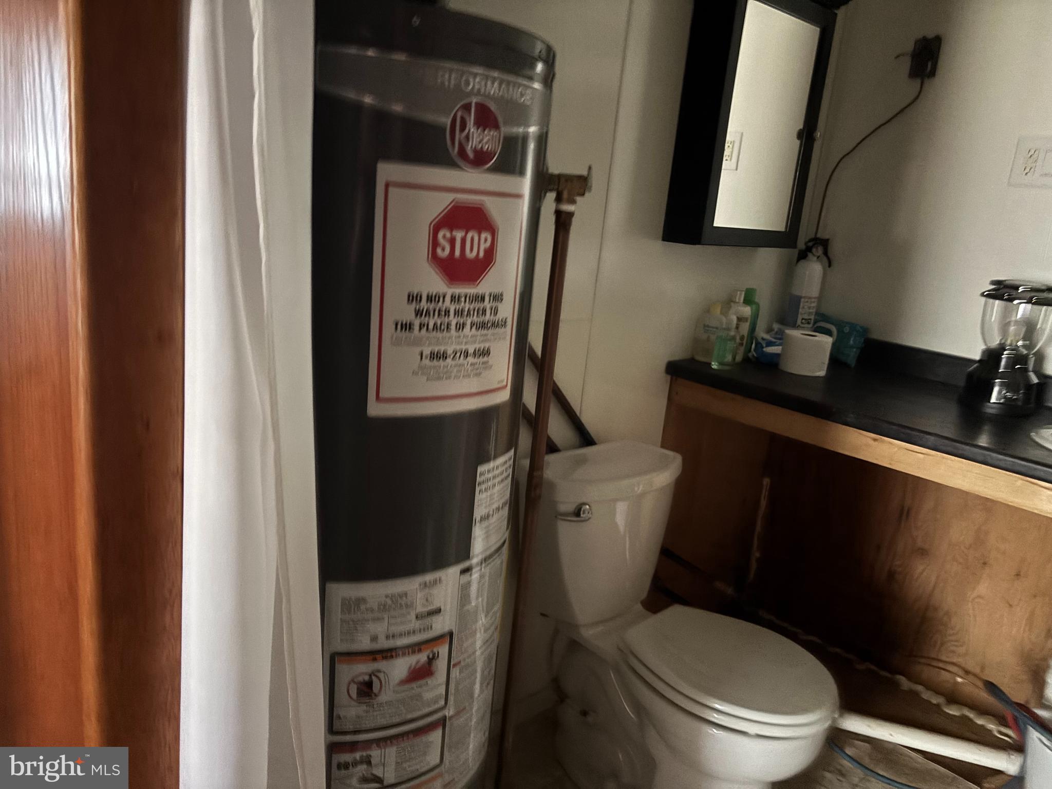 1066 Eddy Ridge Road Orviston, PA 16864 - Photo 32 of 44 a bathroom with a toilet and a sink