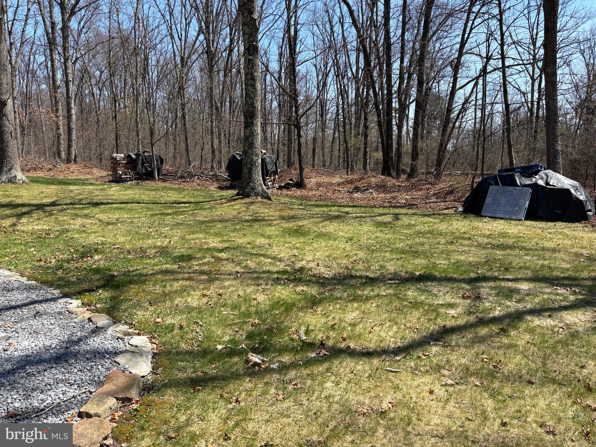 1066 Eddy Ridge Road Orviston, PA 16864 - Photo 41 of 44 a swimming pool with outdoor seating and yard