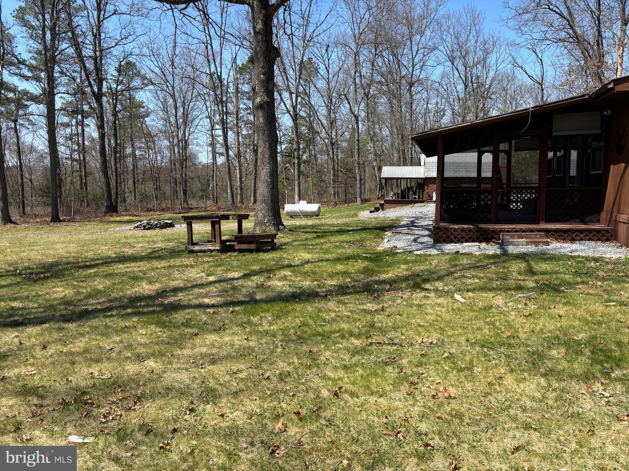 1066 Eddy Ridge Road Orviston, PA 16864 - Photo 43 of 44 a view of a house with backyard and trees