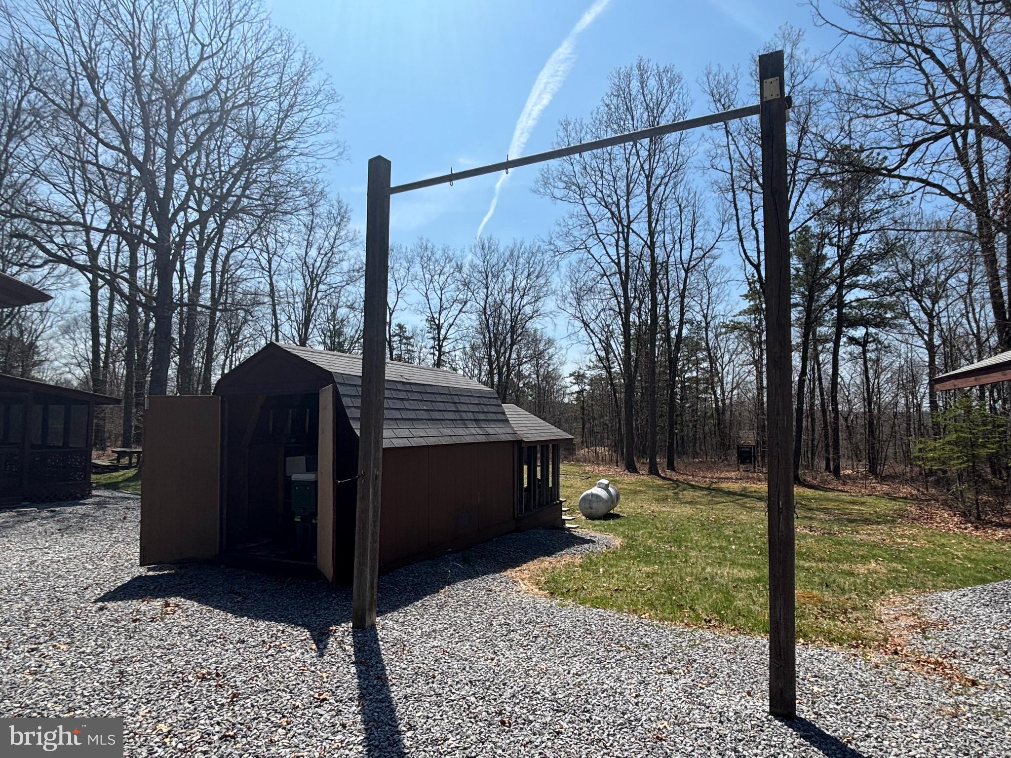 1066 Eddy Ridge Road Orviston, PA 16864 - Photo 6 of 44 a view of a house with a yard
