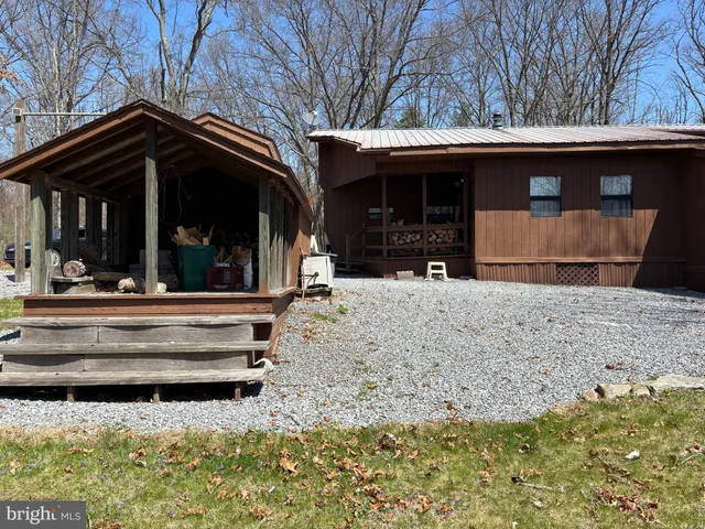 a view of house with a outdoor space
