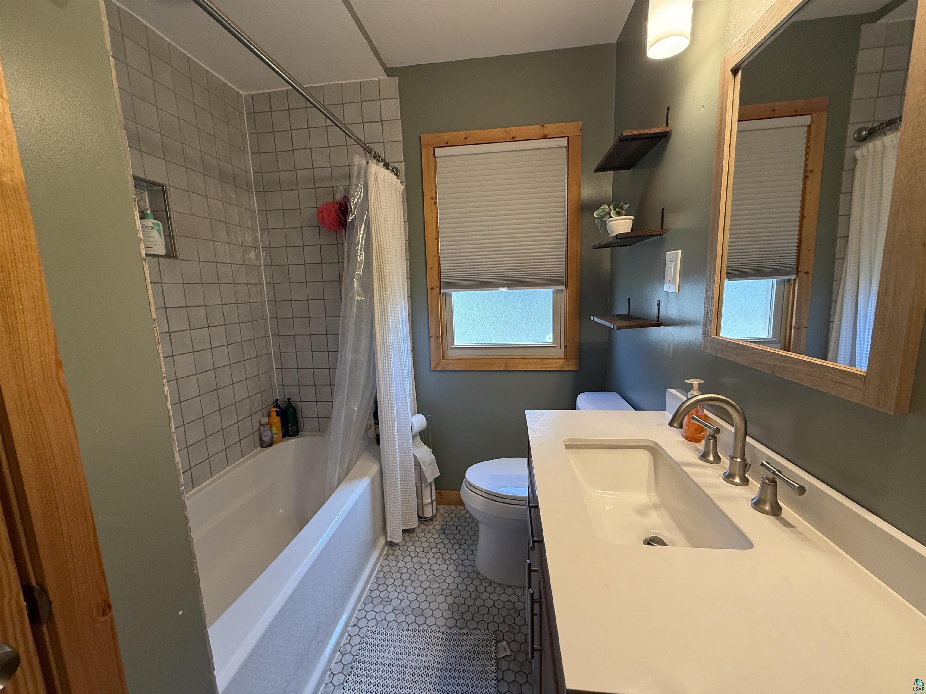 402 Alcohol Road Wrenshall, MN 55797 - Photo 17 of 24 Built-in bathtub with subway tile surround