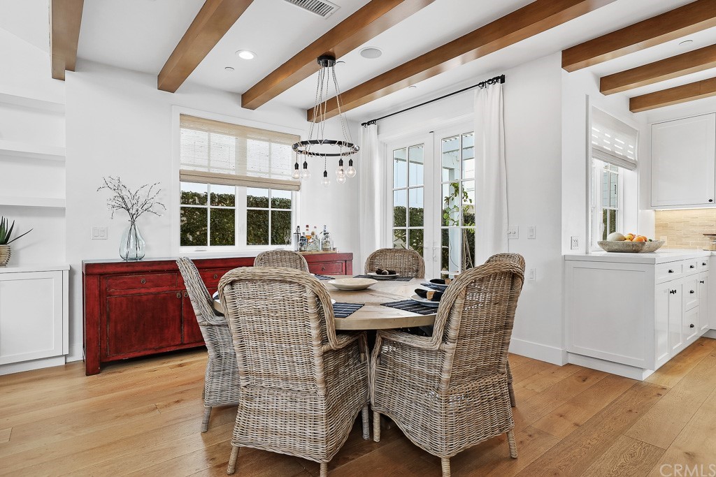 355 Rochester Street Costa Mesa, CA 92627 - Photo 11 of 34 a view of a dining room with furniture window and wooden floor