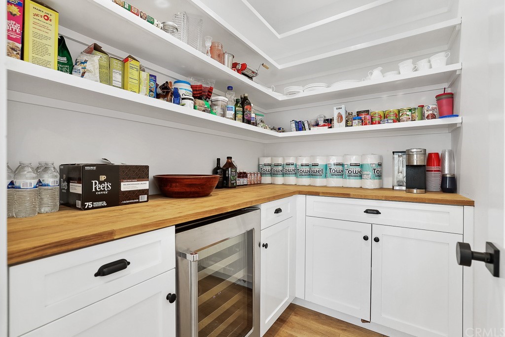 355 Rochester Street Costa Mesa, CA 92627 - Photo 17 of 34 a kitchen with stainless steel appliances granite countertop a sink and cabinets