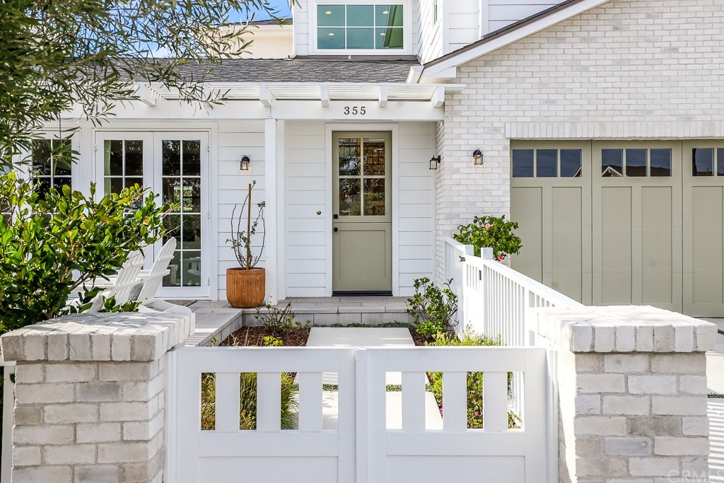 355 Rochester Street Costa Mesa, CA 92627 - Photo 2 of 34 a front view of a house with plants