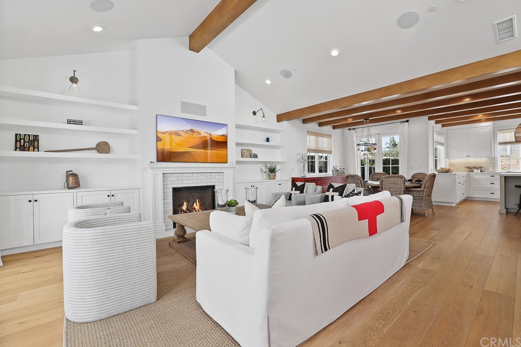 355 Rochester Street Costa Mesa, CA 92627 - Photo 7 of 34 a living room with furniture and fireplace