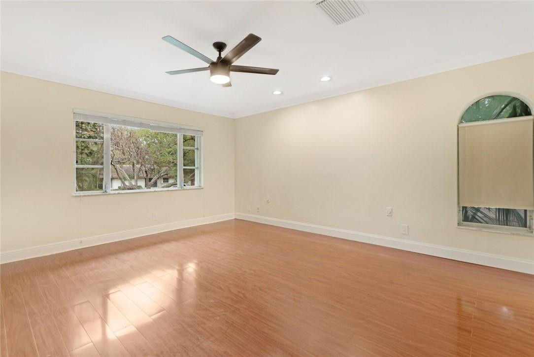 3420 Spring Bluff Place, Unit 39 Lauderhill, FL 33319 - Photo 16 of 32 wooden floor in an empty room with a window