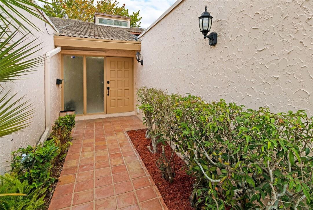3420 Spring Bluff Place, Unit 39 Lauderhill, FL 33319 - Photo 2 of 32 a entryway to the house