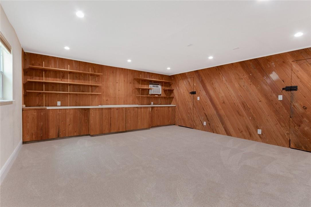 3420 Spring Bluff Place, Unit 39 Lauderhill, FL 33319 - Photo 25 of 32 a view of an empty room with furniture and garage