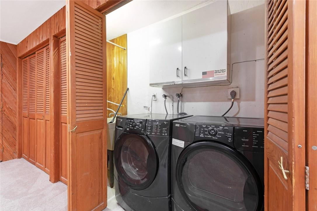 3420 Spring Bluff Place, Unit 39 Lauderhill, FL 33319 - Photo 28 of 32 a utility room with dryer and washer