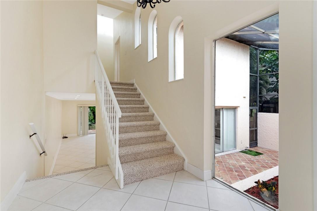 3420 Spring Bluff Place, Unit 39 Lauderhill, FL 33319 - Photo 3 of 32 a view of entryway with furniture and wooden floor