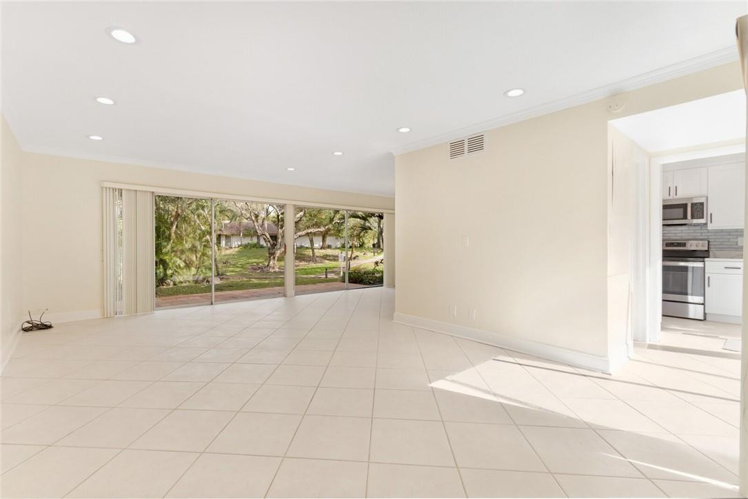 3420 Spring Bluff Place, Unit 39 Lauderhill, FL 33319 - Photo 4 of 32 a view of an empty room with a window