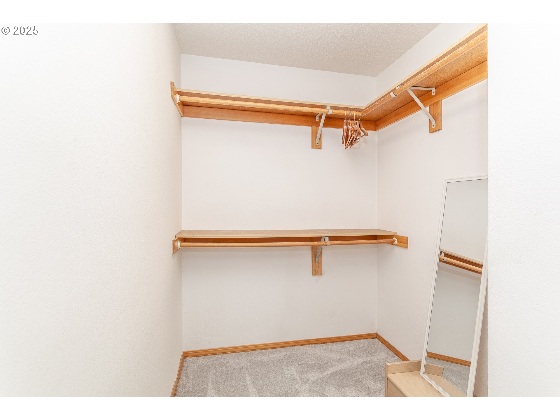 29409 East Edgewater Drive Welches, OR 97067 - Photo 18 of 48 a view of a room with racks on the wall