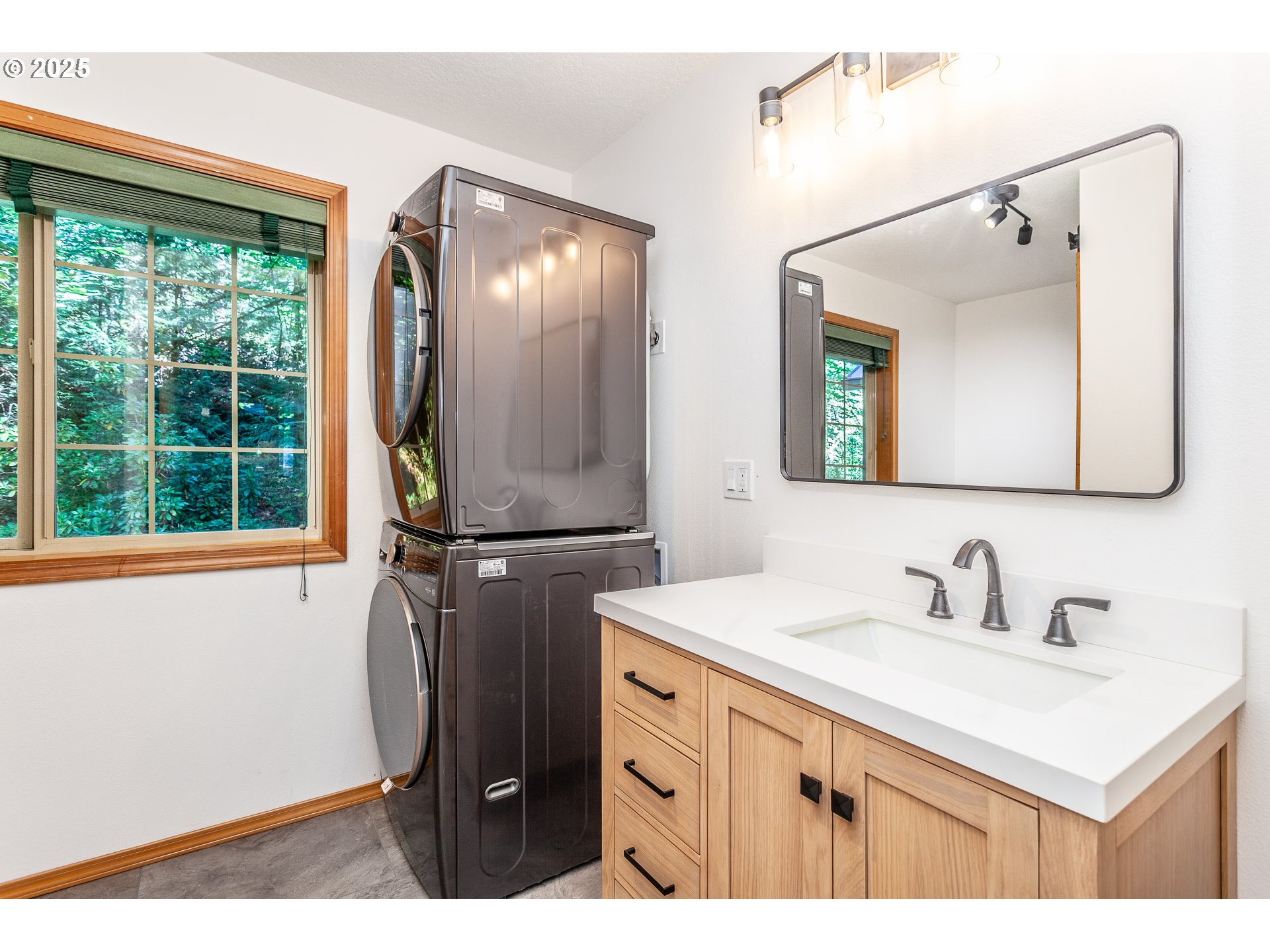 29409 East Edgewater Drive Welches, OR 97067 - Photo 19 of 48 a bathroom with a sink and a mirror