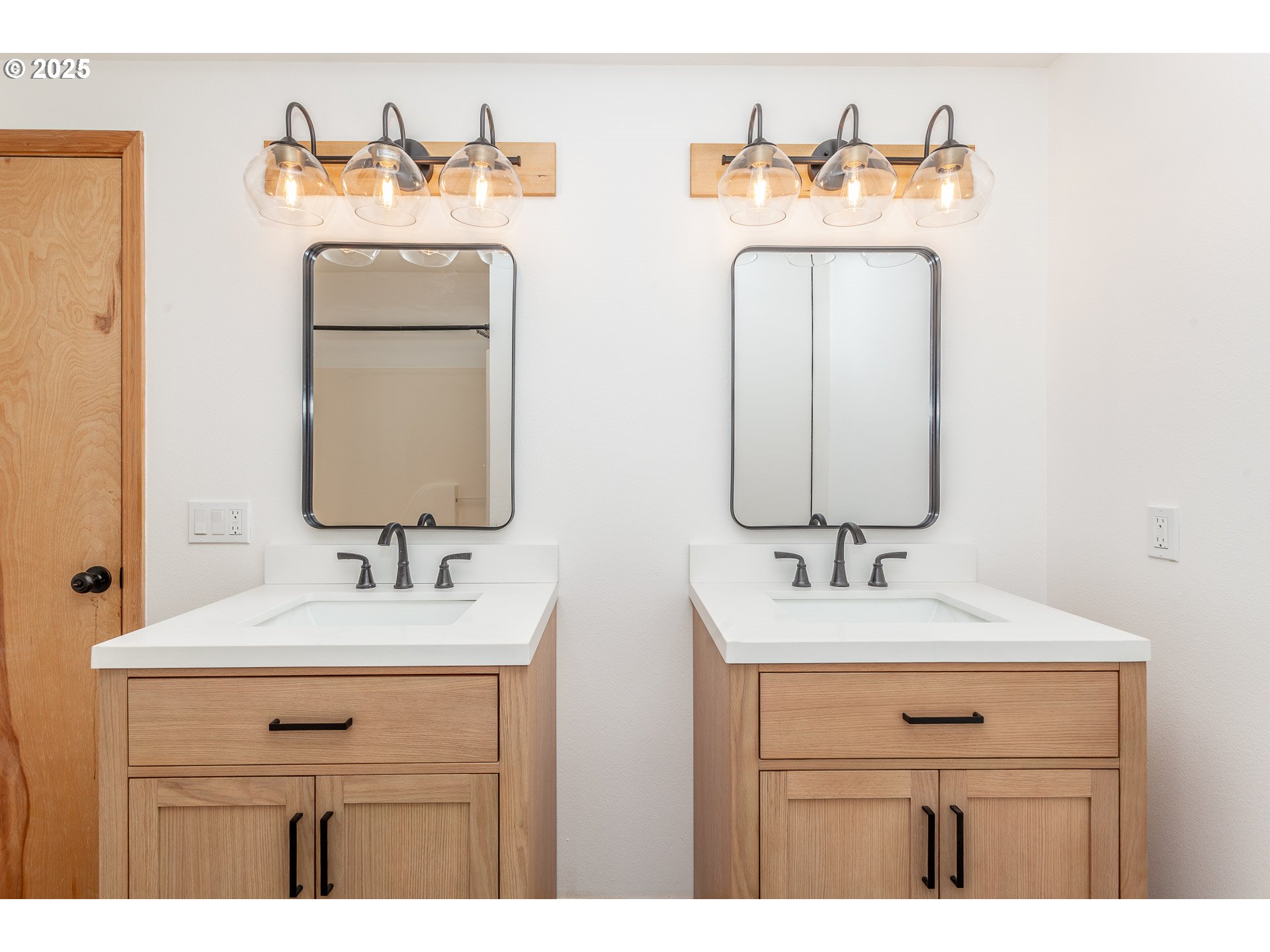 29409 East Edgewater Drive Welches, OR 97067 - Photo 37 of 48 a bathroom with a sink vanity and a mirror