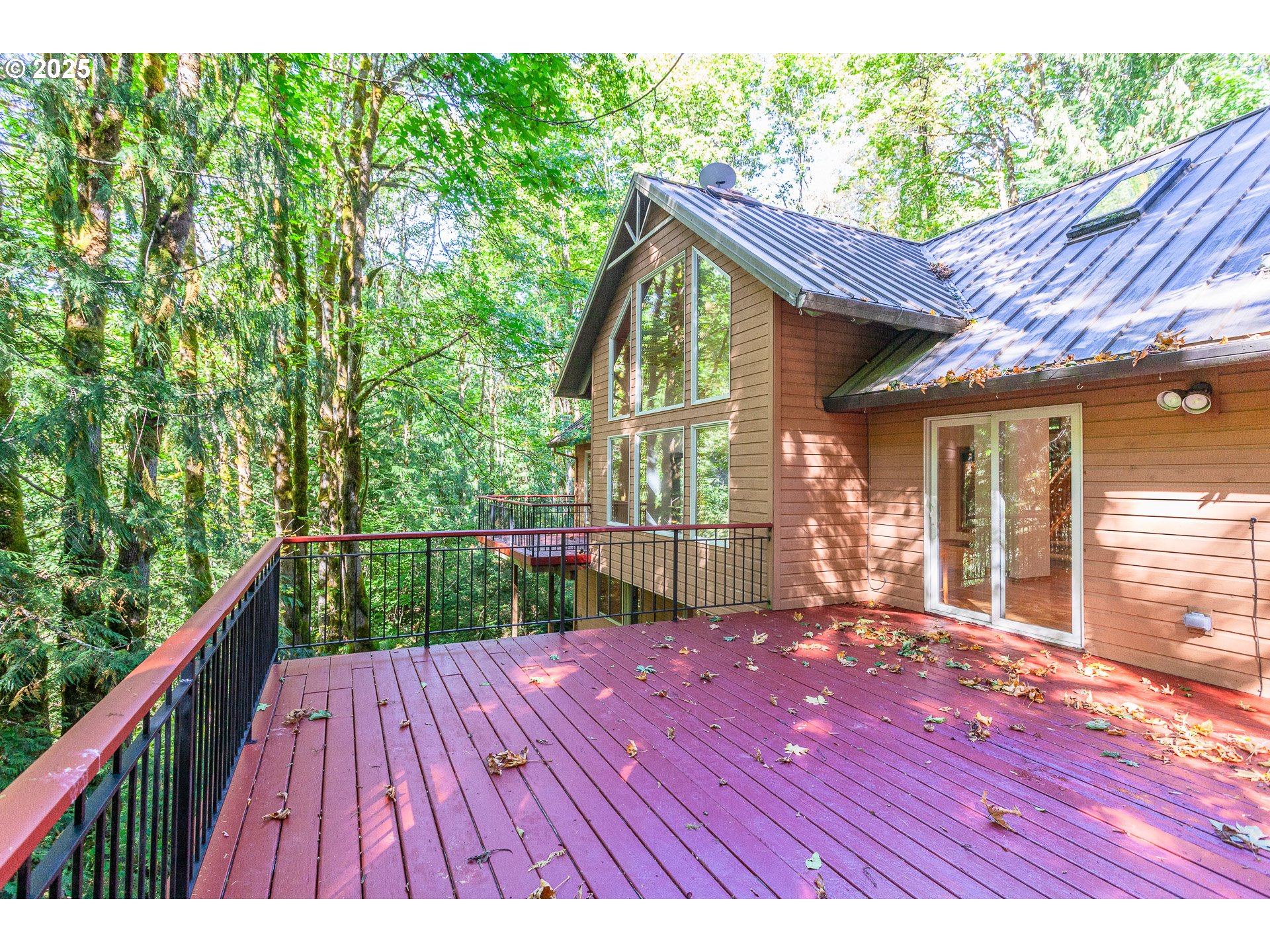 29409 East Edgewater Drive Welches, OR 97067 - Photo 10 of 48 a view of house with backyard and wooden floor
