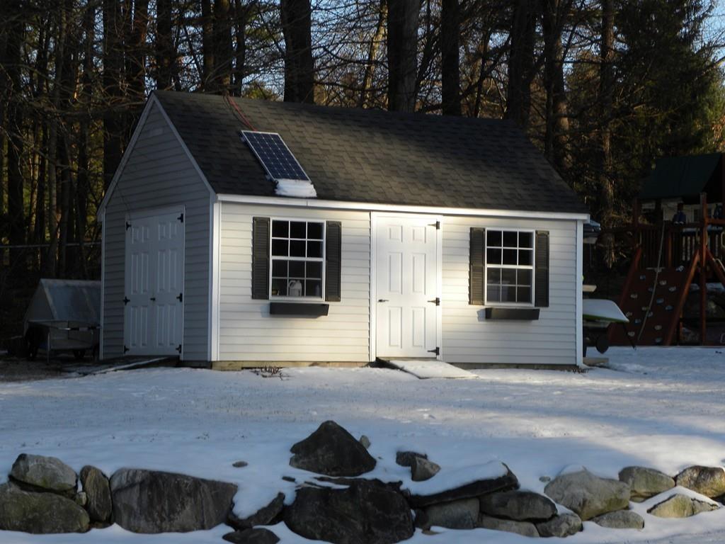 14 Samuel Road Chelmsford, MA 01824 - Photo 26 of 36 a front view of a house with a yard