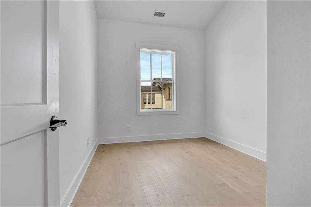 180 Rolison Way Fayetteville, GA 30214 - Photo 29 of 55 an empty room with a window