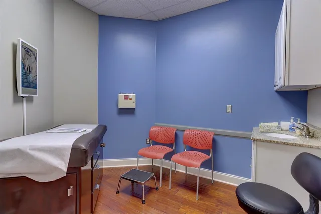 a room with furniture and a chair