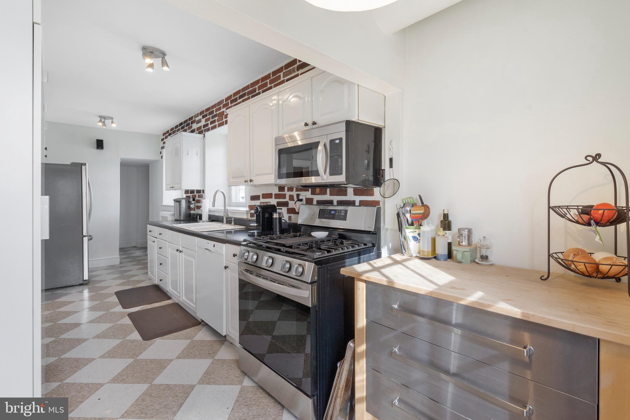 323 Pembroke Road Bala Cynwyd, PA 19004 - Photo 17 of 51 Kitchen with gas cooking and two exterior doors