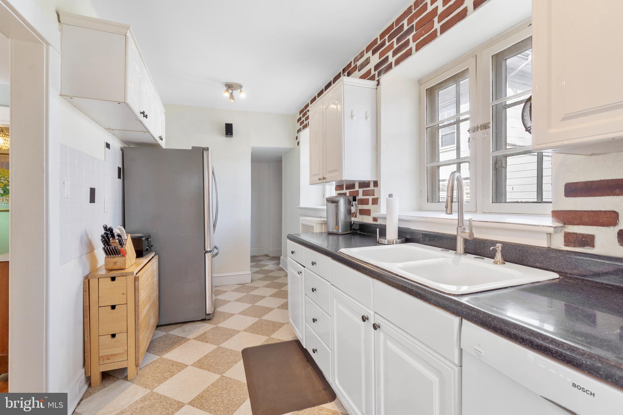 323 Pembroke Road Bala Cynwyd, PA 19004 - Photo 18 of 51 Kitchen with gas cooking and two exterior doors
