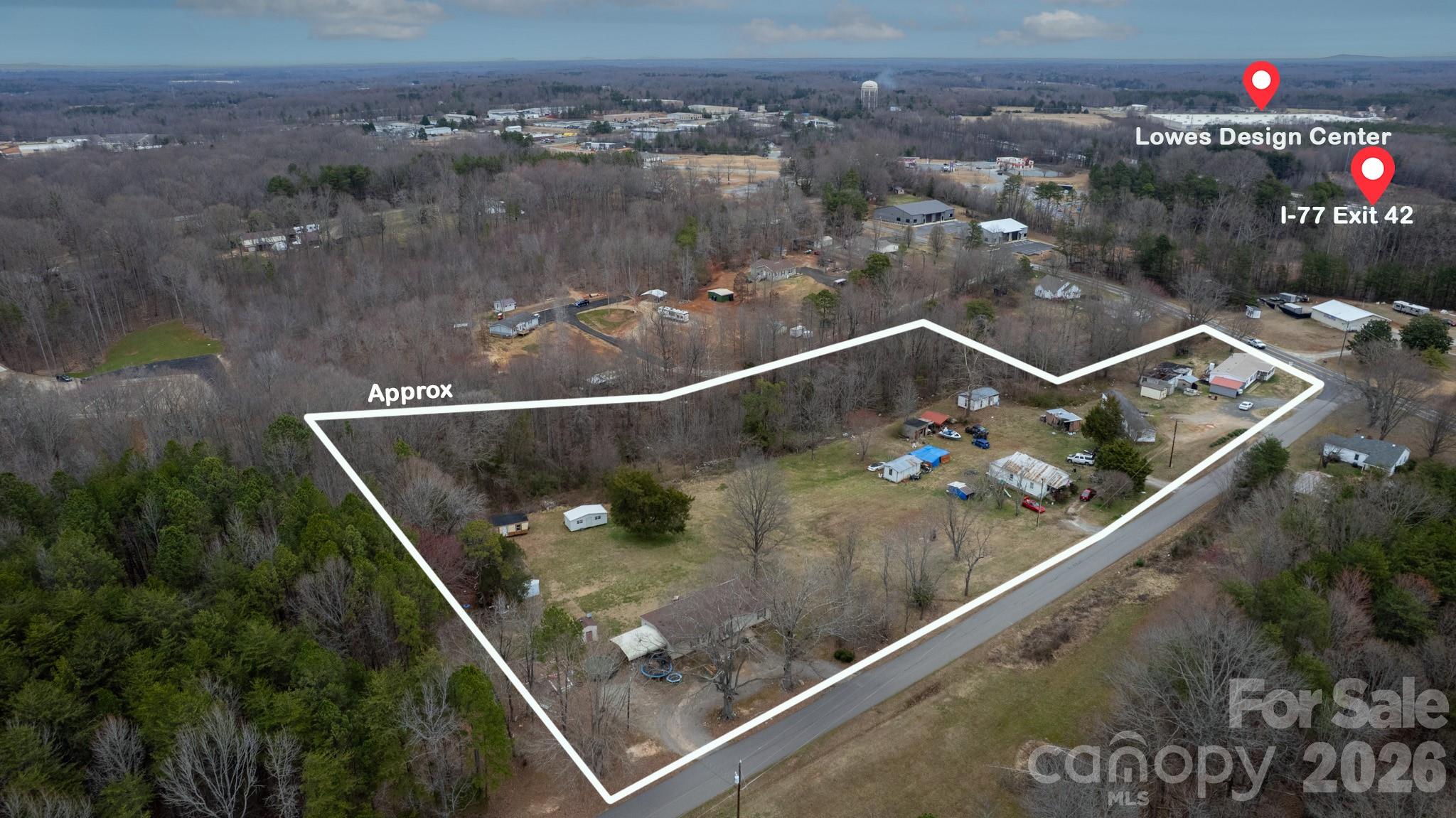 116 Lipe Road Troutman, NC 28166 - Photo 6 of 11 an aerial view of a residential houses with city view