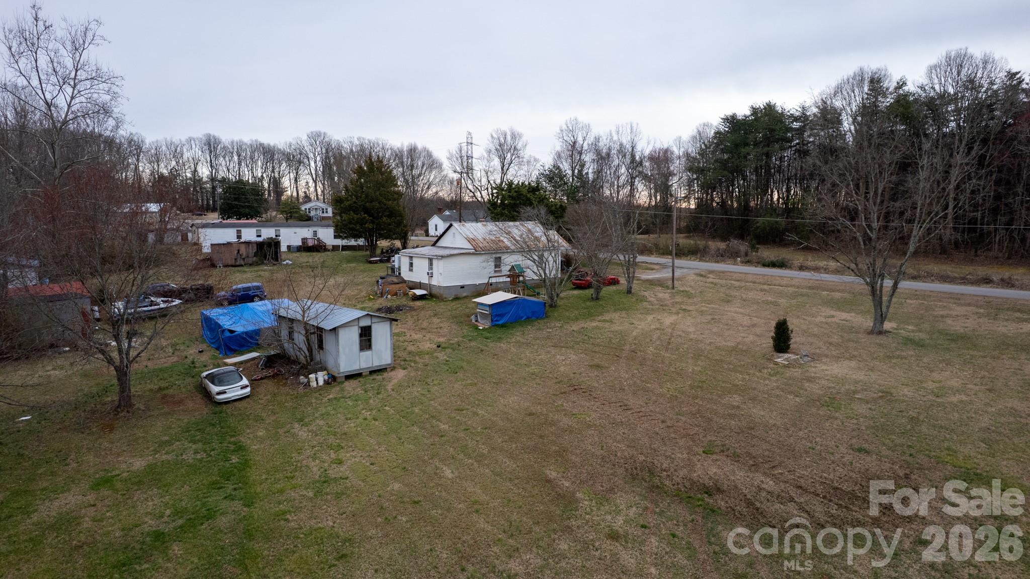 116 Lipe Road Troutman, NC 28166 - Photo 10 of 11 a view of a backyard with sitting area