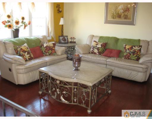 1 Birch Road Edison, NJ 08817 - Photo 2 of 10 a living room with furniture and a table