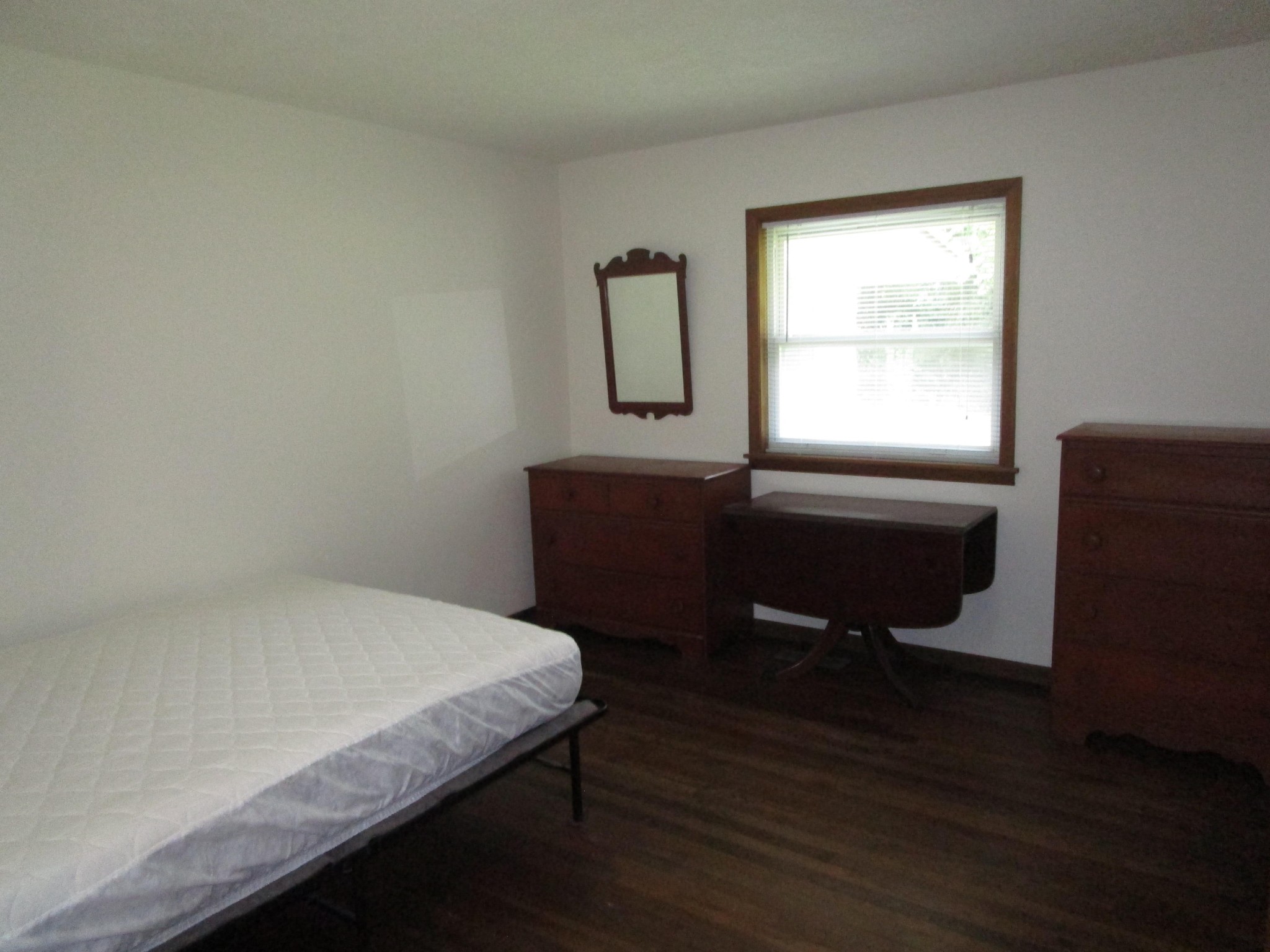 102 Darwin Lane Oak Ridge, TN 37830 - Photo 13 of 19 a bedroom with a bed and a window
