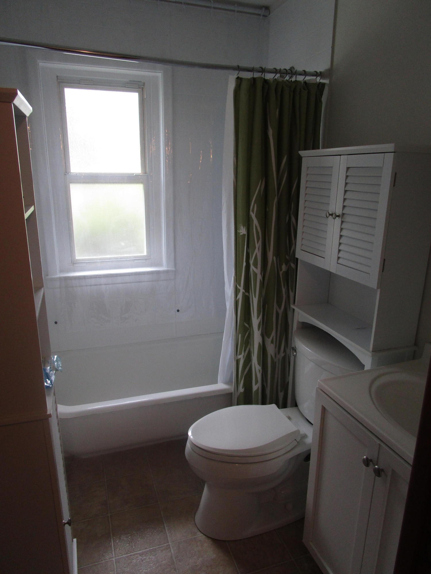 102 Darwin Lane Oak Ridge, TN 37830 - Photo 14 of 19 a bathroom with a toilet and a shower
