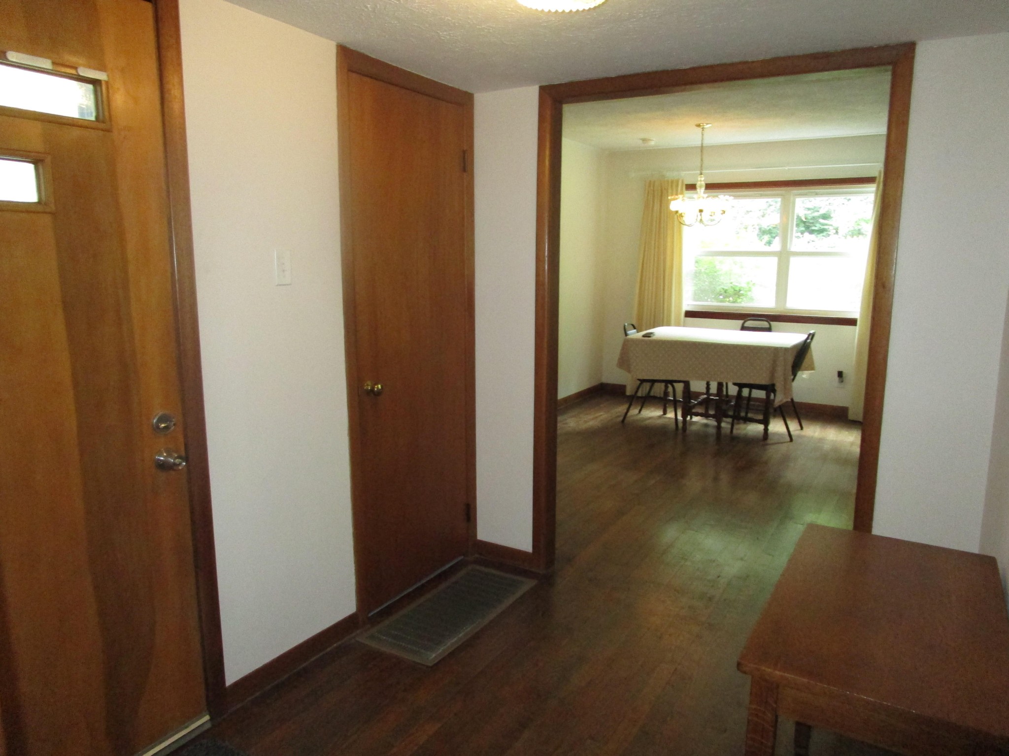 102 Darwin Lane Oak Ridge, TN 37830 - Photo 2 of 19 a dining room with furniture wooden floor and a window