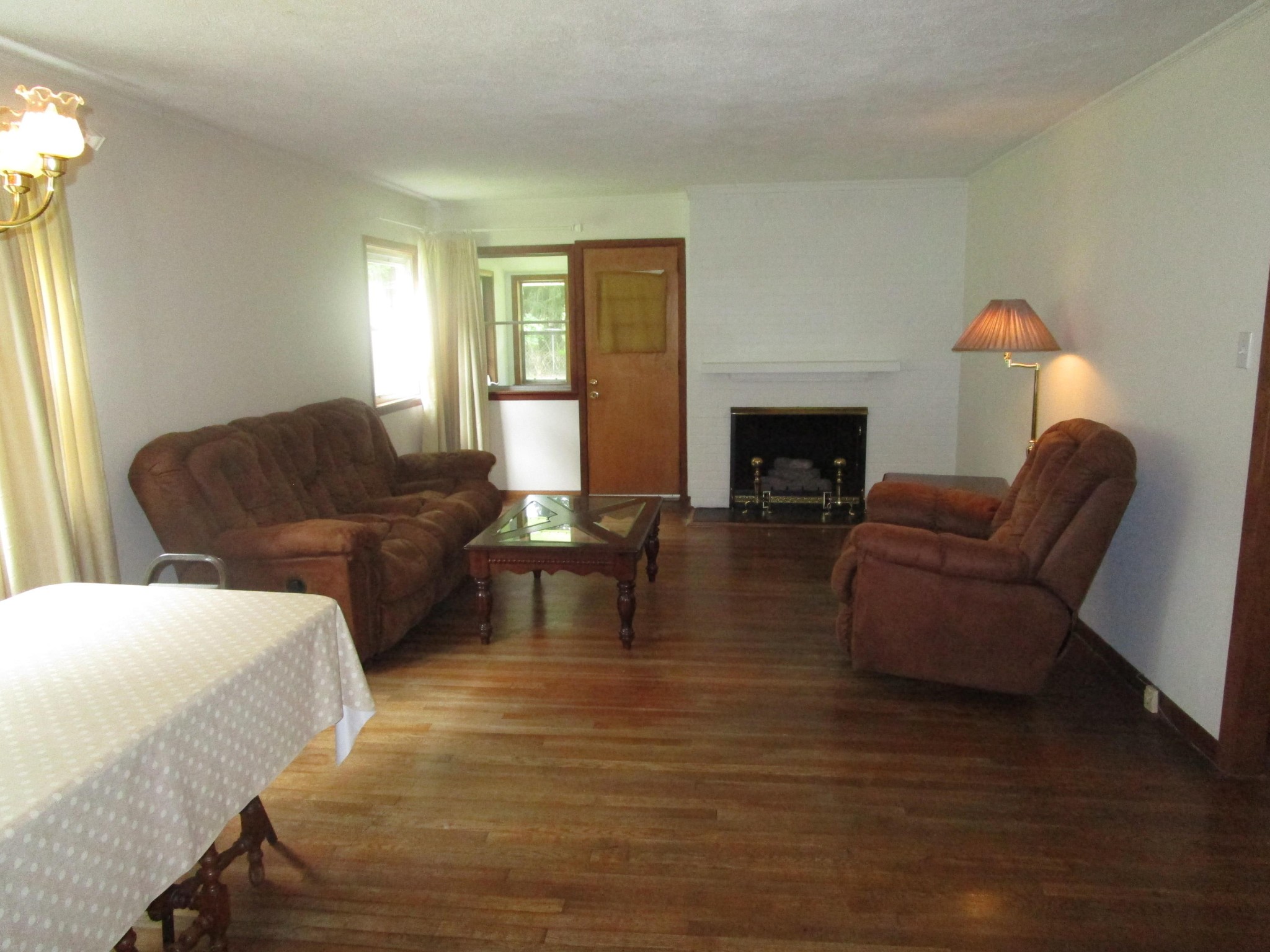 102 Darwin Lane Oak Ridge, TN 37830 - Photo 7 of 19 a living room with furniture and a fireplace