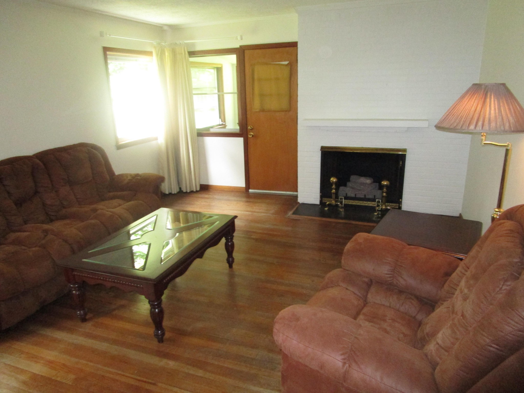 102 Darwin Lane Oak Ridge, TN 37830 - Photo 10 of 19 a living room with furniture and a fireplace