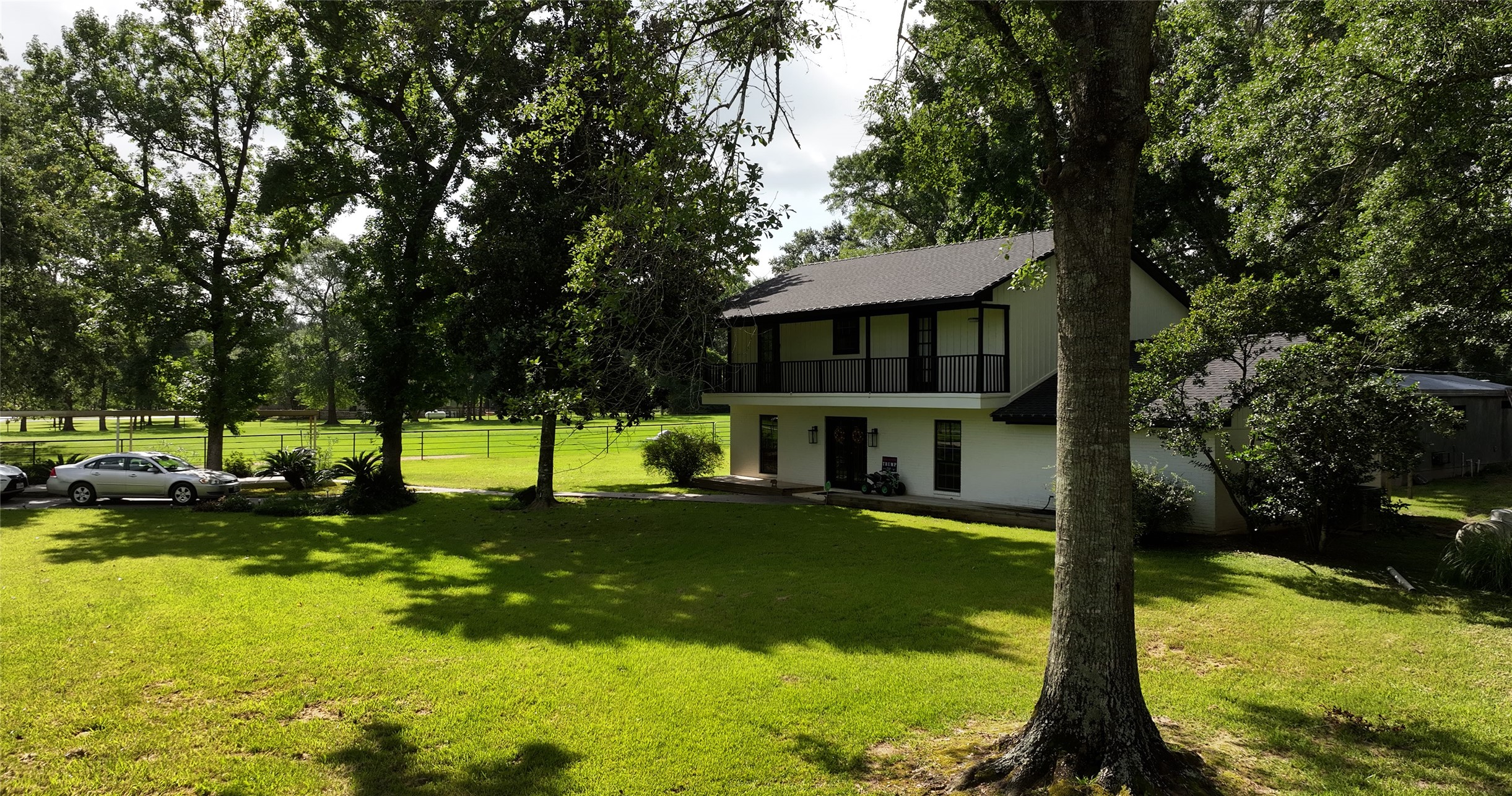 11291 Darby Loop Conroe, TX 77385 - Photo 14 of 18 a view of a house with swimming pool and sitting area