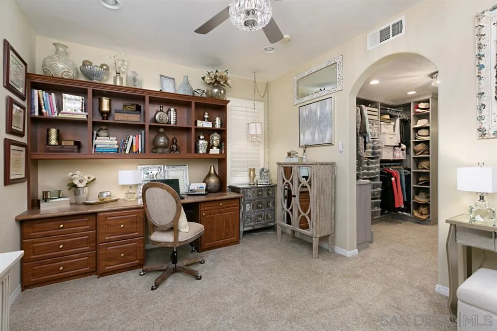 6991 Goldstone Road Carlsbad, CA 92009 - Photo 11 of 25 a view of a workspace with furniture