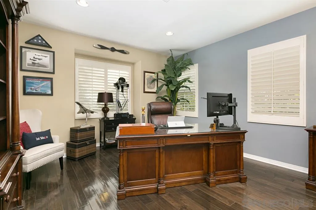 6991 Goldstone Road Carlsbad, CA 92009 - Photo 16 of 25 a work room with furniture and a potted plant