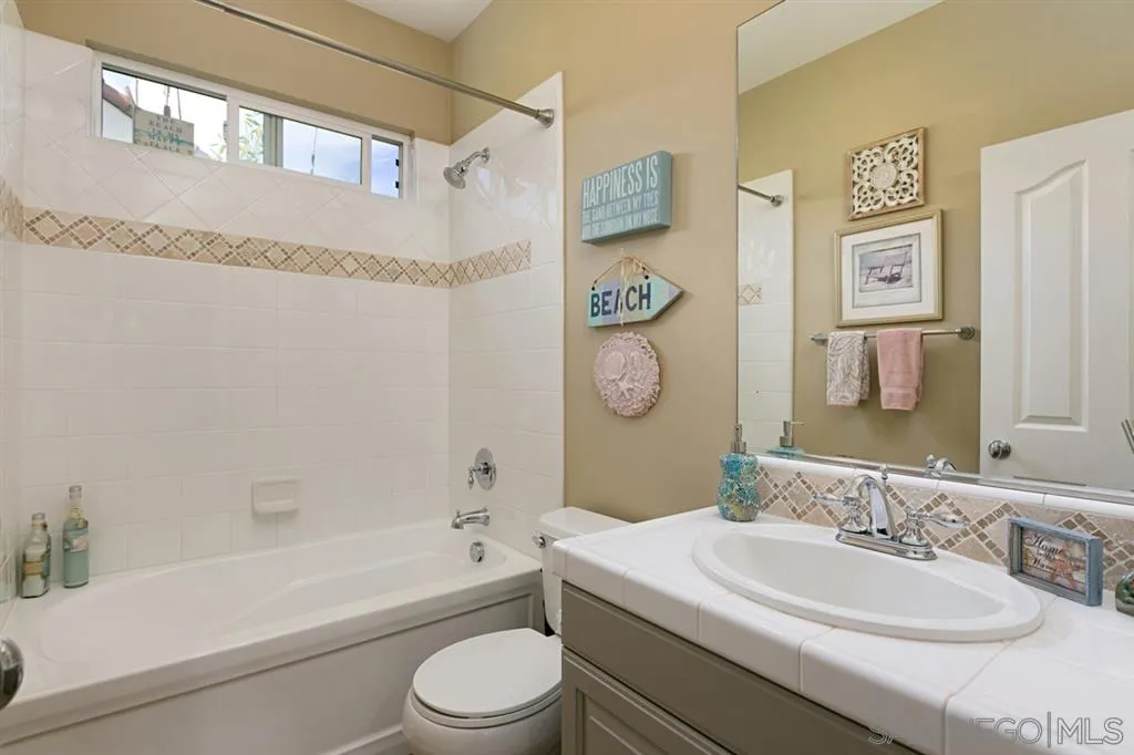 6991 Goldstone Road Carlsbad, CA 92009 - Photo 17 of 25 a bathroom with a sink a toilet and a bathtub