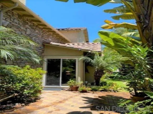 6991 Goldstone Road Carlsbad, CA 92009 - Photo 23 of 25 a view of a building with a tree