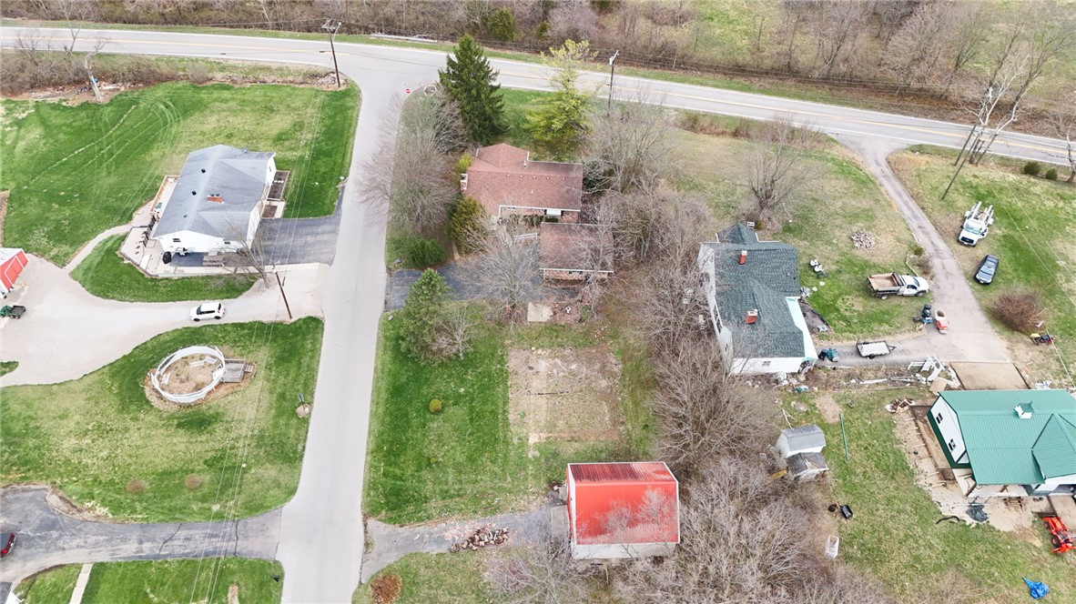6711 Hamilton-Middletown Road Franklin, OH 45005 - Photo 42 of 49 An aerial perspective reveals a sprawling property with diverse structures and ample green space.