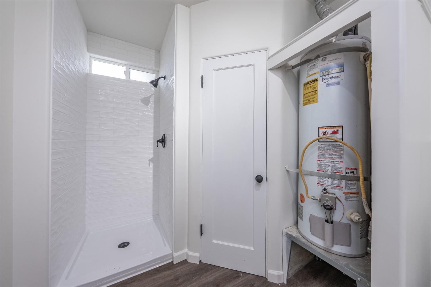 1600 West 5th Street Madera, CA 93637 - Photo 31 of 46 a bathroom with a shower