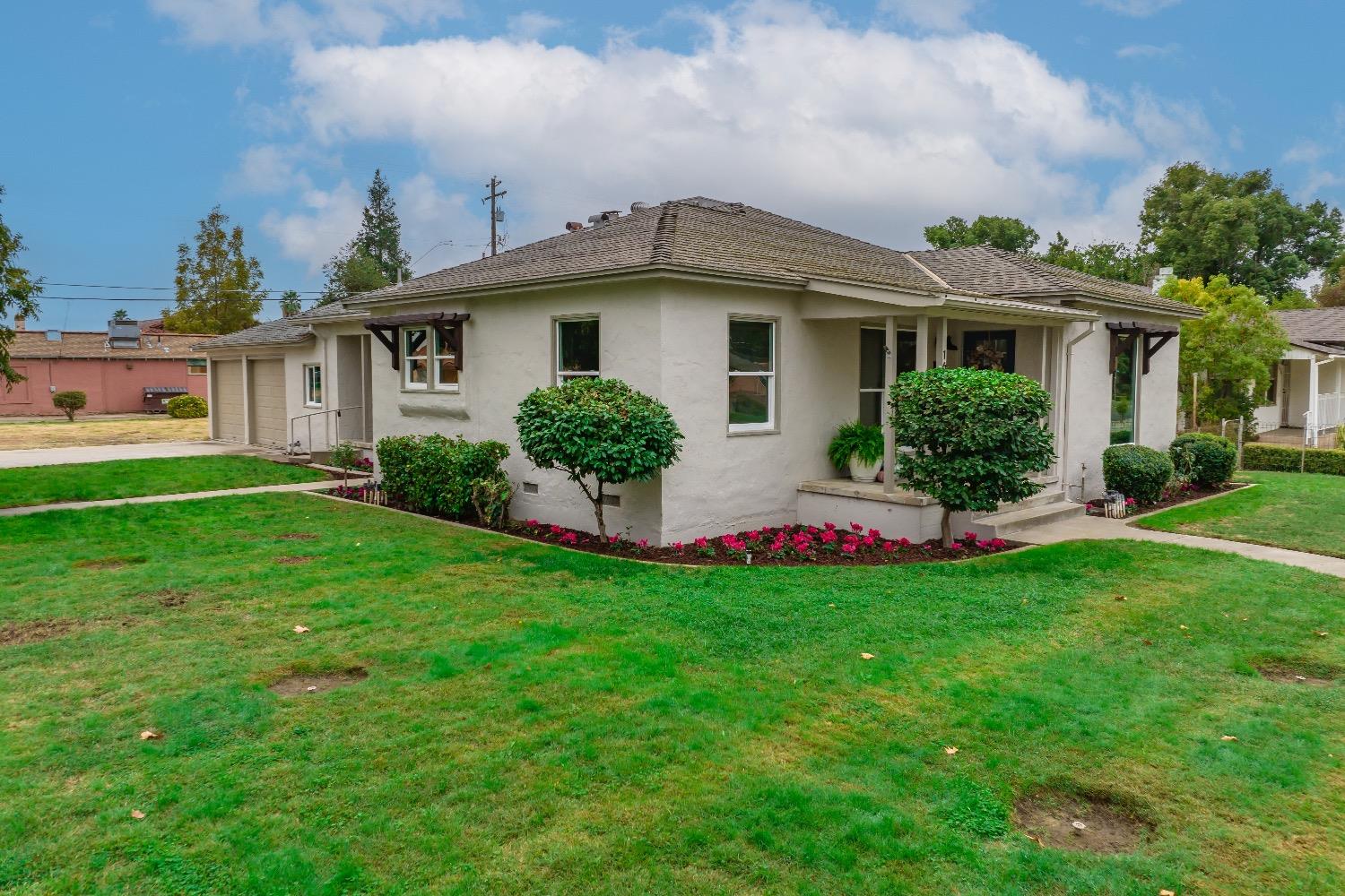 1600 West 5th Street Madera, CA 93637 - Photo 35 of 46 a front view of house with yard and green space