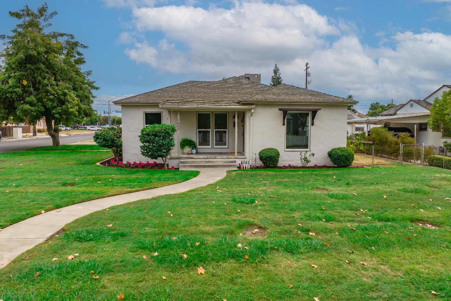 1600 West 5th Street Madera, CA 93637 - Photo 36 of 46 a view of a house with garden