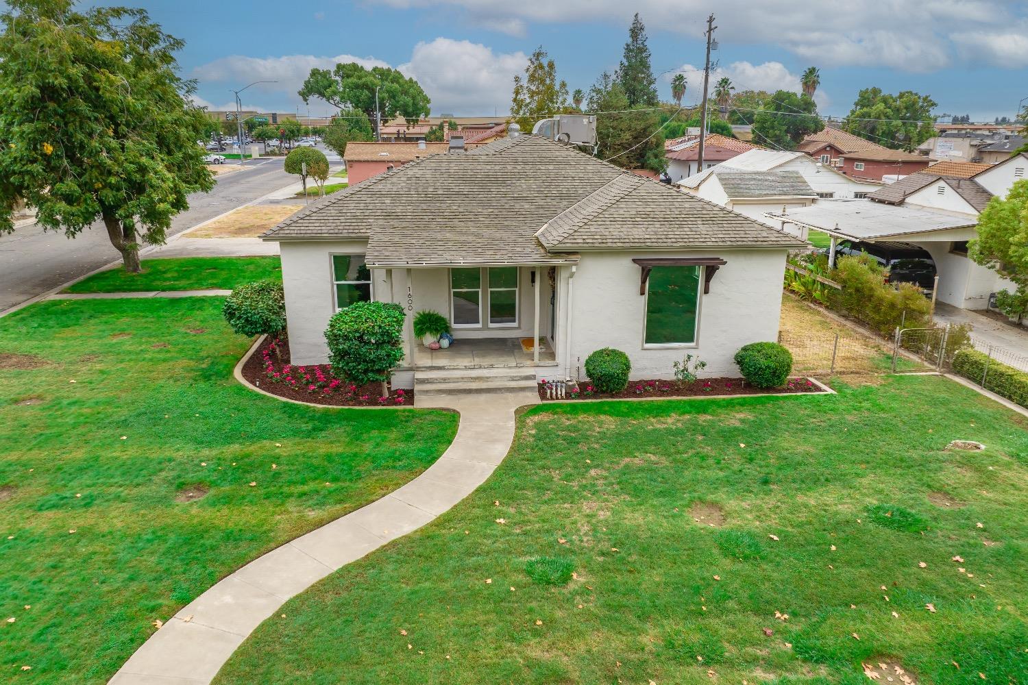 1600 West 5th Street Madera, CA 93637 - Photo 37 of 46 a view of a house with backyard
